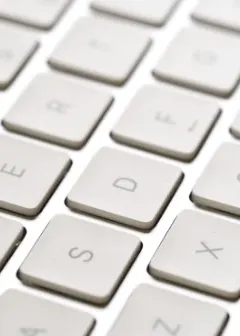 Close-up of computer keyboard to symbolize book editing.