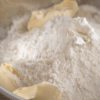 Dry flour and chucks of butter in bowl