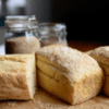 Loaves of fresh-baked bread on a board