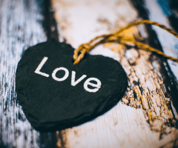 black wooden heart on a string