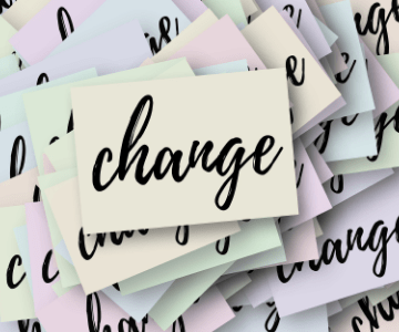 pile of post it notes with the word change