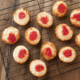 Jam Christmas cookies on a cooking rack